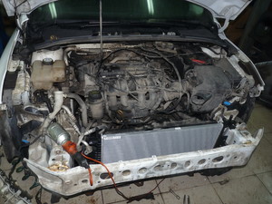 Замена радиаторов кондиционера и охлаждения Ford Focus 1